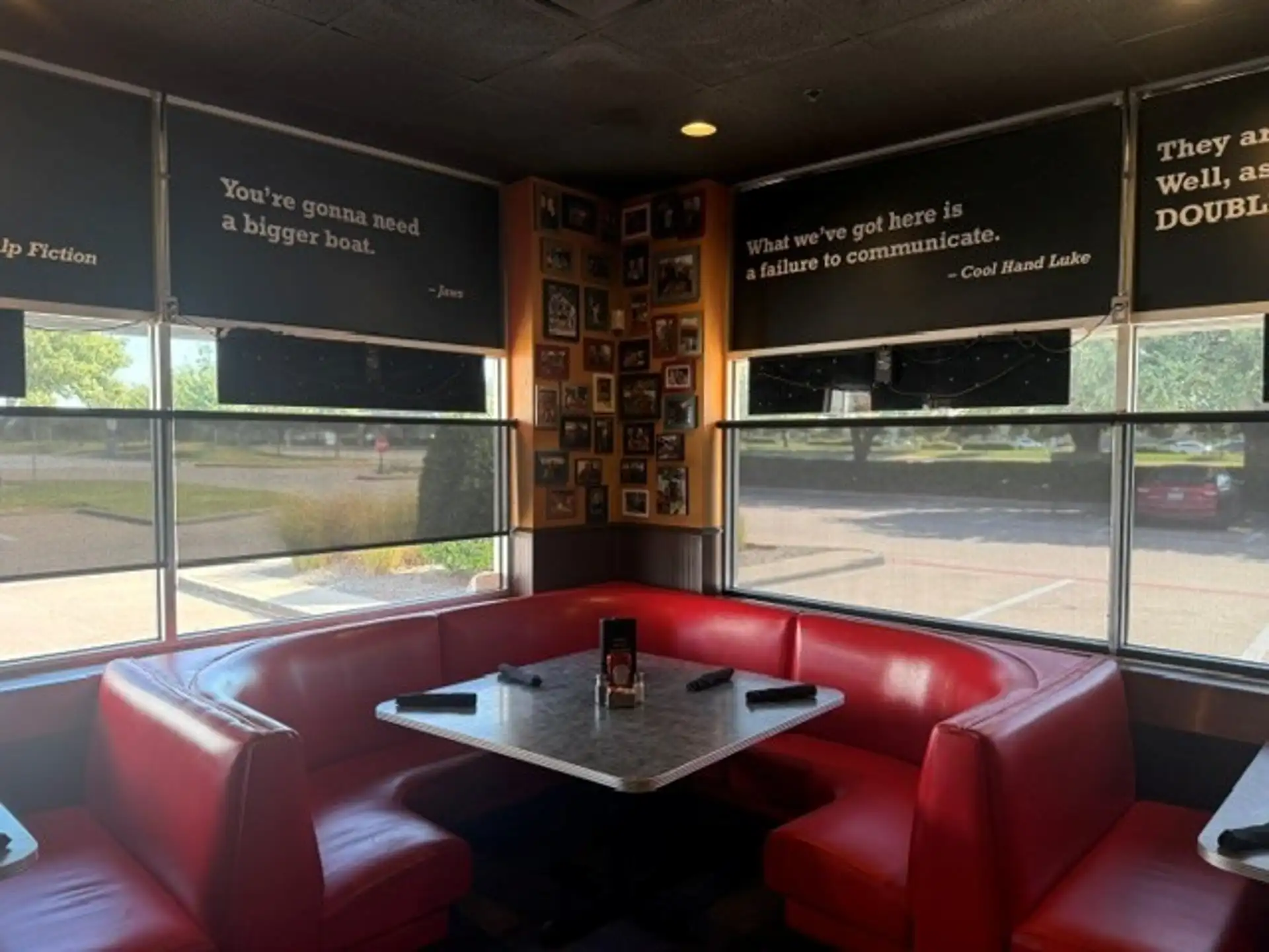 Red neon booths and memorabilia walls